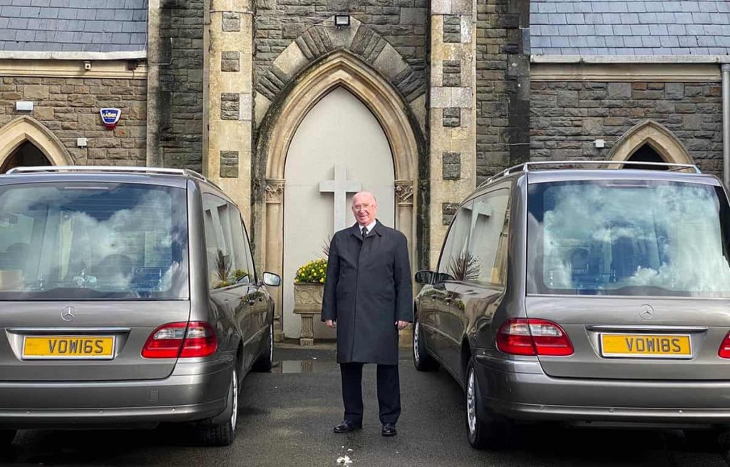 Morgan T. Vowels Standing Outside A Church