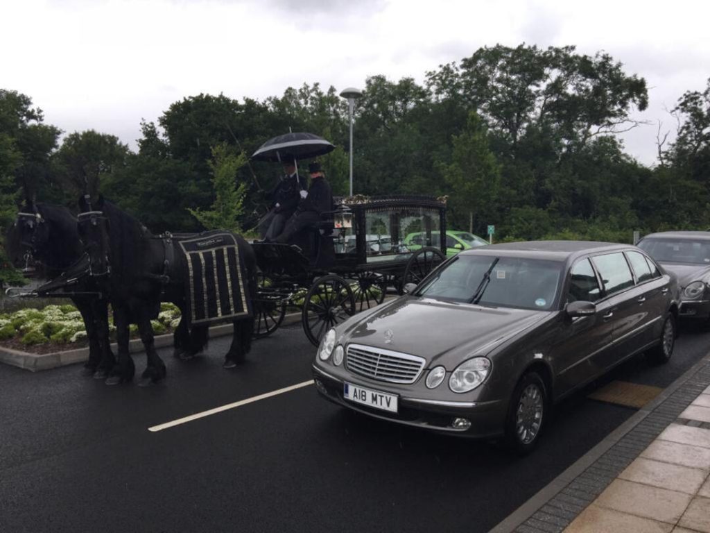 funeral procession through town